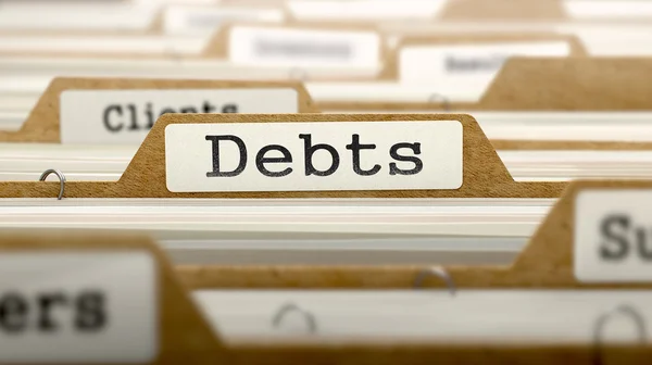 Debts Concept with Word on Folder. — Zdjęcie stockowe