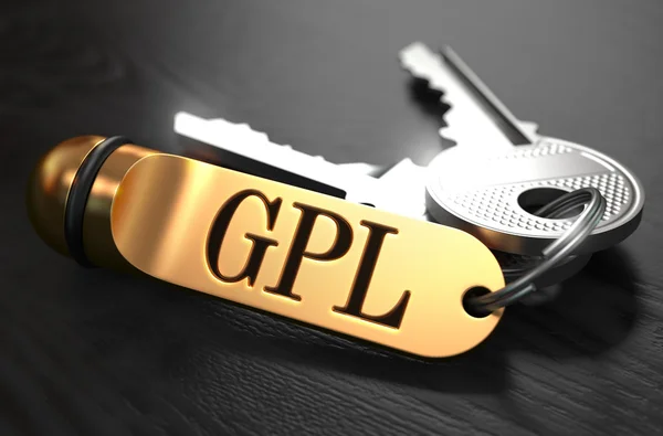 GPL - mazzo di chiavi con testo sul portachiavi dorato . — Foto Stock