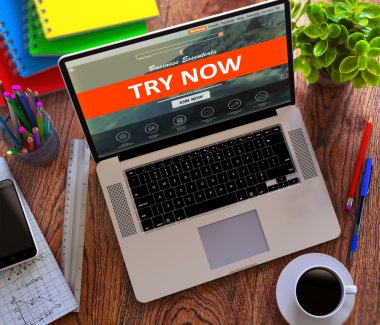 Try Now Concept on Modern Laptop Screen.