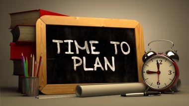 Handwritten Time to Plan on a Chalkboard.
