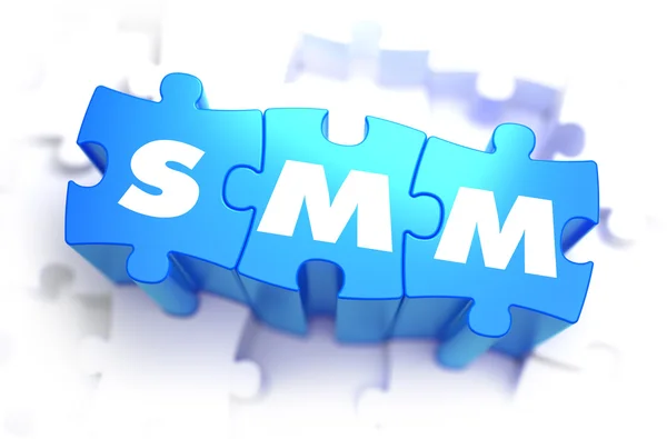 SMM - Texto sobre quebra-cabeças azuis . — Fotografia de Stock