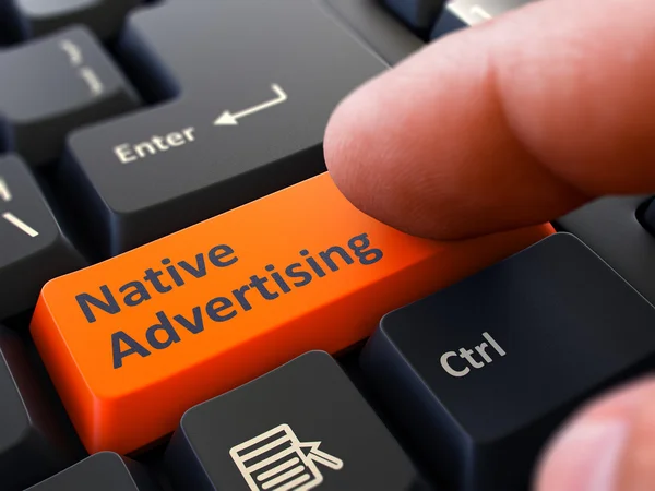 Native Advertising - Clicking Orange Keyboard Button. — Stock Photo, Image