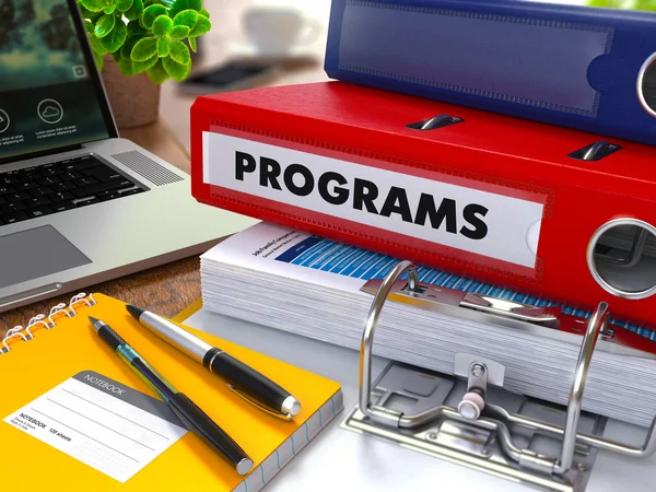 Red Ring Binder with Inscription Programs. — Stock Photo, Image