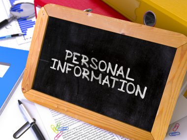 Personal Information Handwritten on Chalkboard.