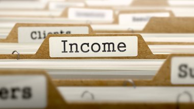 Income Concept with Word on Folder.