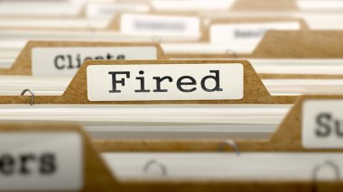 Fired Concept with Word on Folder.