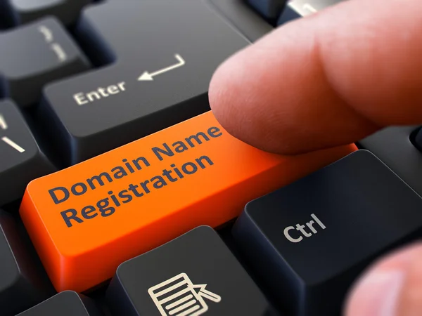 Finger Presses Orange Keyboard Button Domain Name Registration. — Zdjęcie stockowe