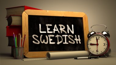 Learn Swedish - Chalkboard with Inspirational Quote.