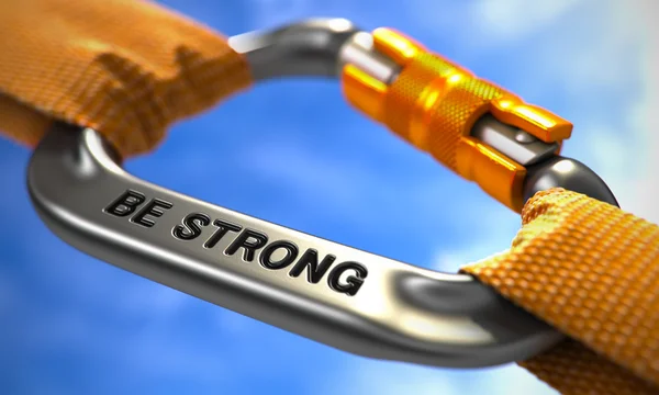 Be Strong on Chrome Carabine with a Orange Ropes. — Stok fotoğraf