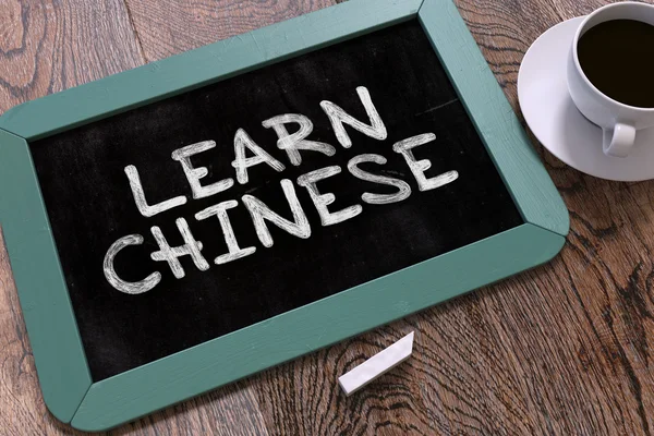 Handwritten Learn Chinese on a Chalkboard. — Stock Fotó