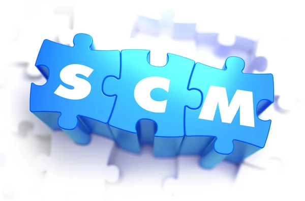 SCM - Texto sobre quebra-cabeças azuis . — Fotografia de Stock