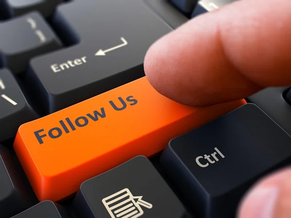 Folgen Sie uns - klicken Sie auf orange Tastatur-Taste. — Stockfoto