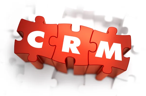 Word - CRM on Red Puzzles. — Stock Photo, Image