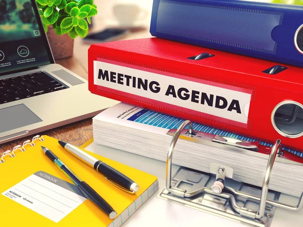 Meeting Agenda on Red Office Folder. Toned Image. — Stockfoto