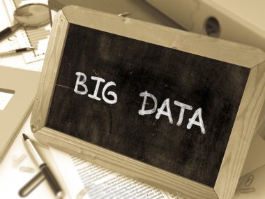 Hand Drawn Big Data Concept on Small Chalkboard.