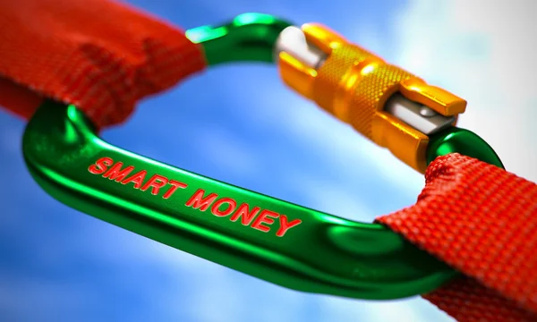 Smart Money on Green Carabiner between Red Ropes. — Stok fotoğraf