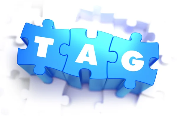 Tag - weißes Wort auf blauen Puzzles. — Stockfoto