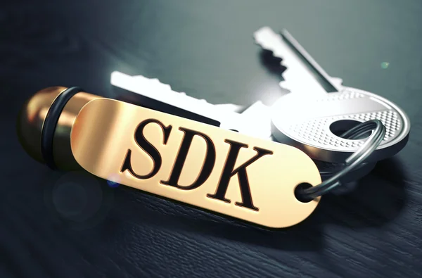 SDK written on Golden Keyring. — Stock Photo, Image