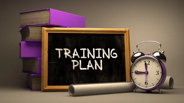 Plano de treinamento escrito à mão por giz branco em um quadro negro . — Fotografia de Stock
