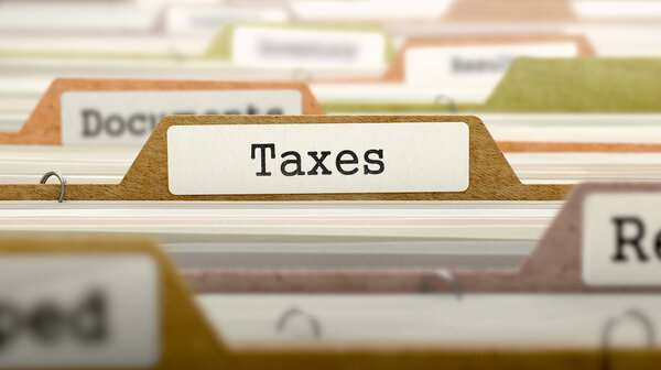 Taxes Concept on Folder Register. Stock Image