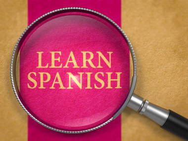 Learn Spanish through Loupe on Old Paper.