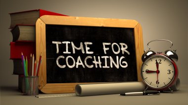 Hand Drawn Time for Coaching Concept on Chalkboard.