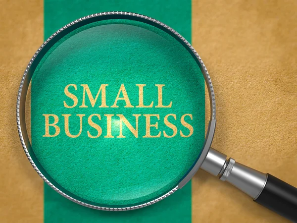 Small Business Concept through Magnifier. — Stockfoto