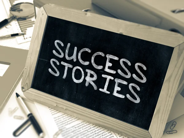 Handgeschriebene Erfolgsgeschichten auf einer Tafel. — Stockfoto