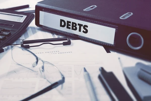 Debts on Office Folder. Toned Image. — Stockfoto