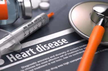 Heart disease - Printed Diagnosis on Grey Background. clipart