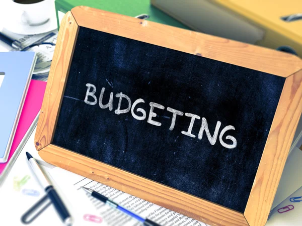 Budgeting Concept Hand Drawn on Chalkboard. — Stockfoto