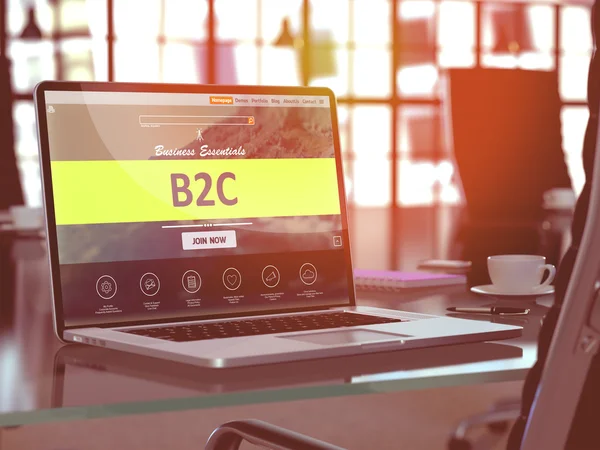 B2C sul computer portatile sullo sfondo del luogo di lavoro moderno . — Foto Stock