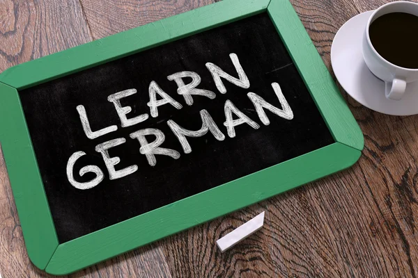 Hand Drawn Learn German Concept on Chalkboard. — Stok fotoğraf