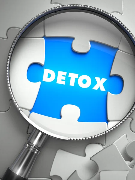 Detox - Puzzle with Missing Piece through Loupe. — Stockfoto