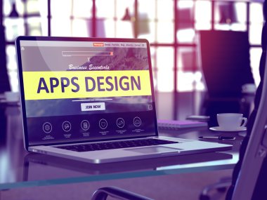 Apps Design on Laptop in Modern Workplace Background.