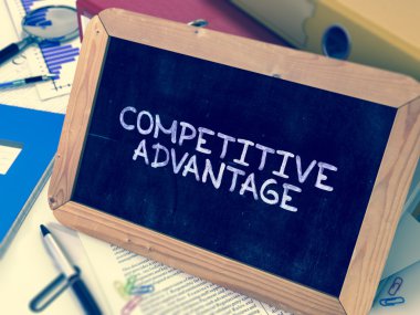Hand Drawn Competitive Advantage Concept on Small Chalkboard.