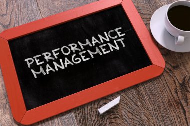 Handwritten Performance Management on a Chalkboard.