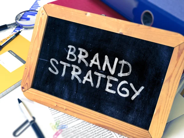 Brand Strategy Handwritten by White Chalk on a Blackboard. — 스톡 사진