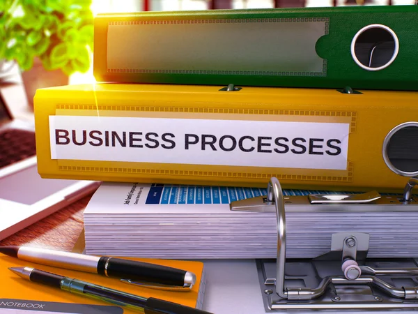 Procesos de negocio en la carpeta amarilla de la oficina. Imagen tonificada . —  Fotos de Stock