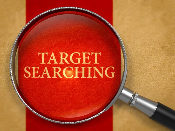 Target Searching through Lens on Old Paper. — Stockfoto