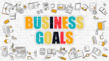 Business Goals on White Brick Wall.