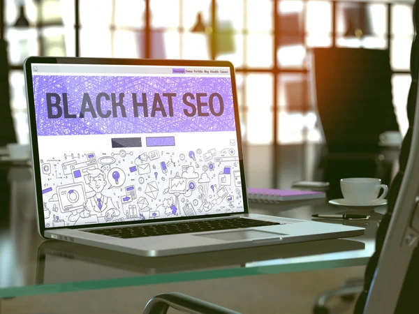 Black Hat SEO no laptop em pano de fundo moderno do local de trabalho . — Fotografia de Stock
