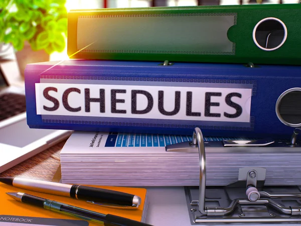 Blue Office Folder with Inscription Schedules. — Stockfoto