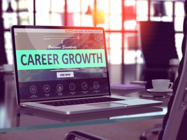 Career Growth on Laptop in Modern Workplace Background.