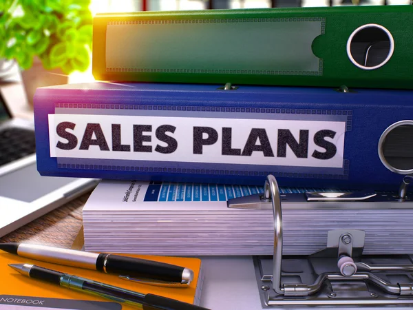 Sales Plans on Blue Ring Binder. Blurred, Toned Image. — Stock Photo, Image