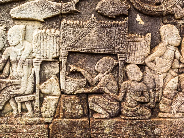 Gamla sten Carving av antika Khmer livsstil — Stockfoto