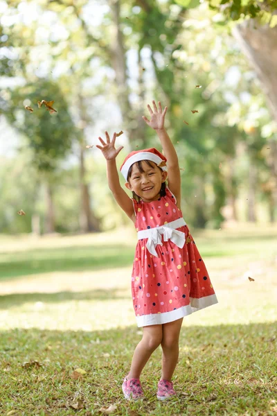 Little girl in Santa hat — Stock Photo, Image