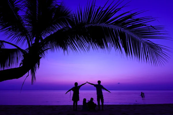 Happy family on sea beach — Stock Photo, Image