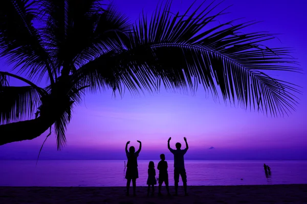 Happy family on sea beach — Stock Photo, Image