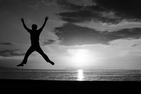 Silhouette of man jumping — Stock Photo, Image